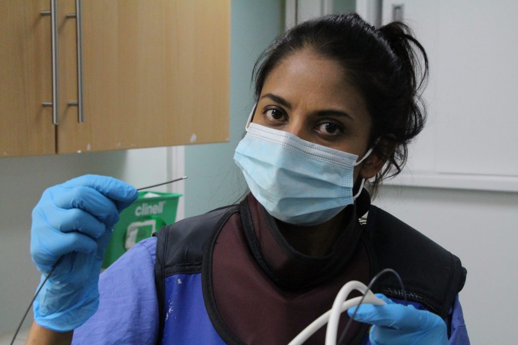 Vandana holds a cryoprobe.