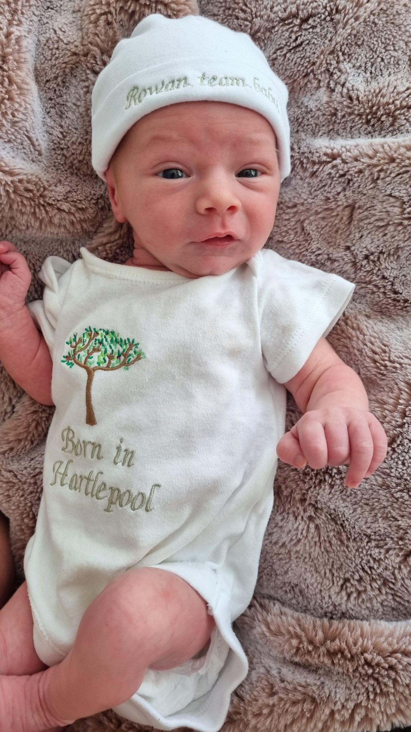Baby Ayda. She wears a oncesie which reads: "Born in Hartlepool".