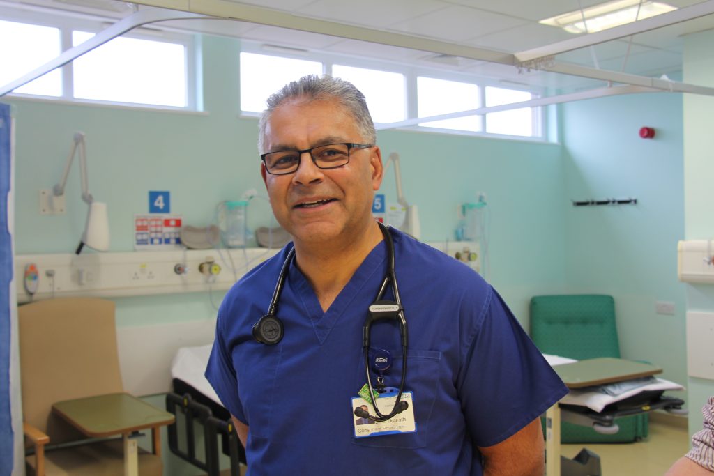 Medical director Deepak Dwarakanath in scrubs