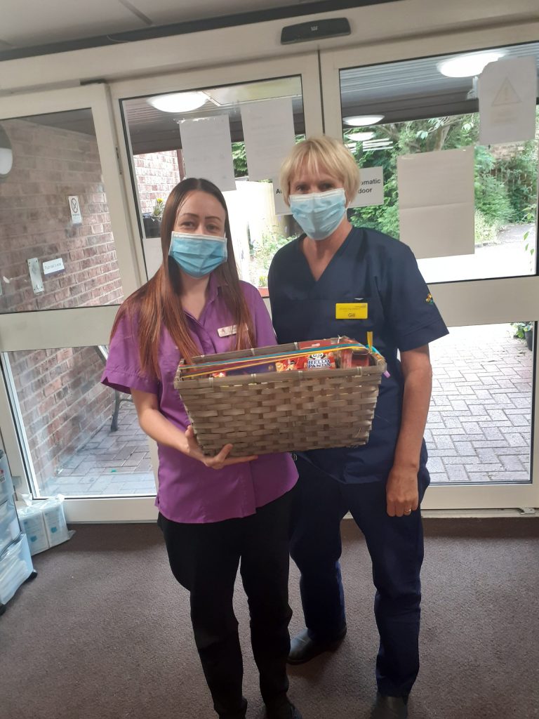 Gill delivering toothbrushes to the care home.