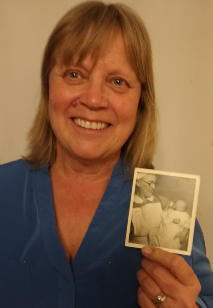 Val Driscoll holds photo of her great auntie district midwife Lilian Richards