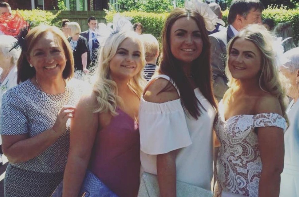 Chris, Alex, Nicole and Victoria at a family wedding.