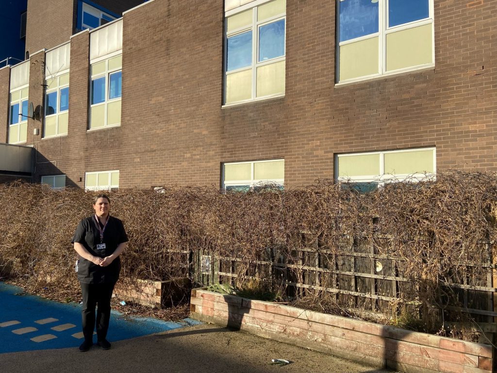 Nicola Critchley standing in the space where the stairs will be added.