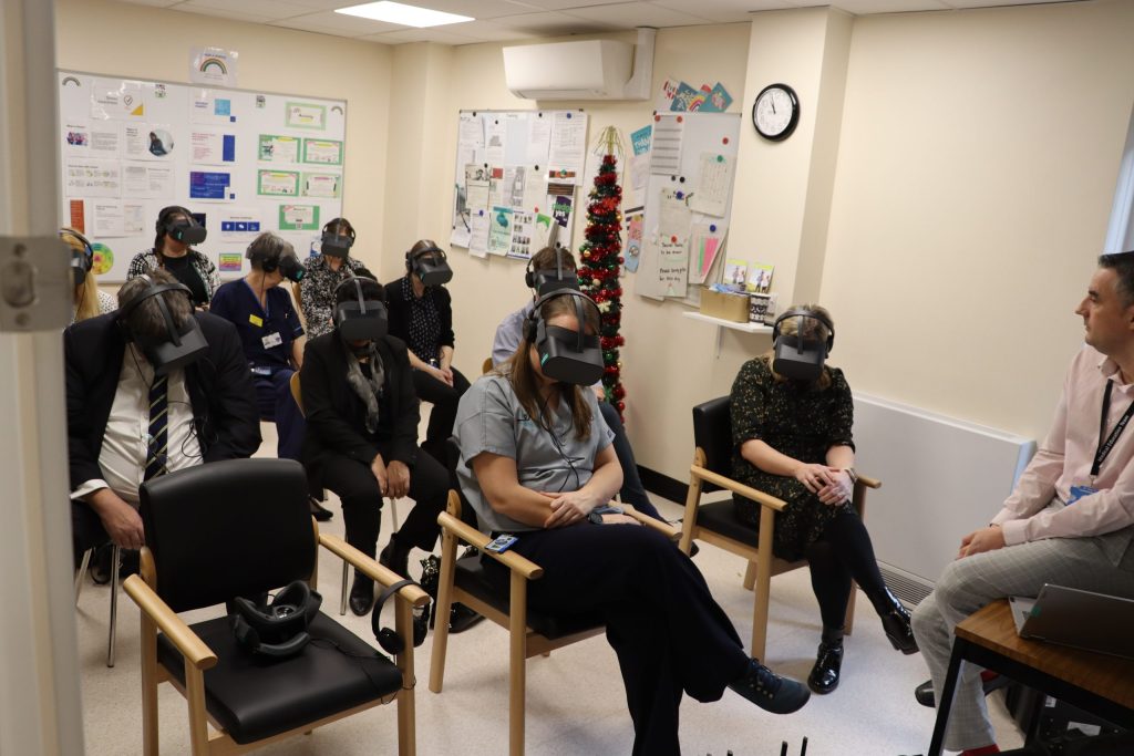 Staff wearing virtual simulation headsets.