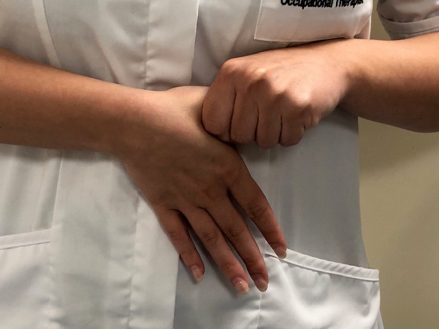 Range of motion image. Thumb exercise.