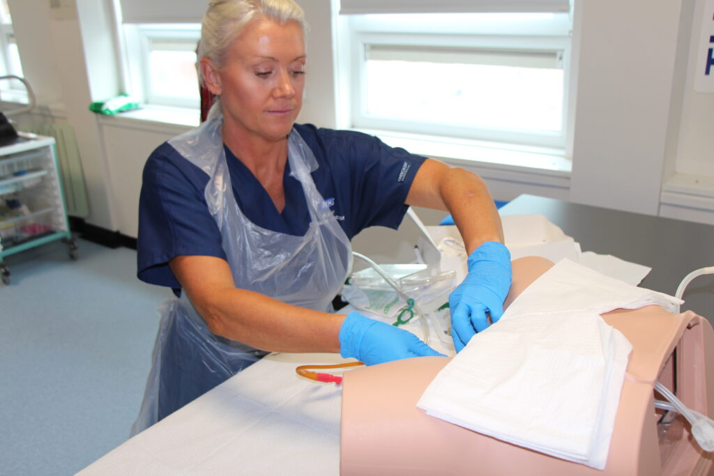 Clinical Educator Karen Hampshire - Demonstrating catheritisation