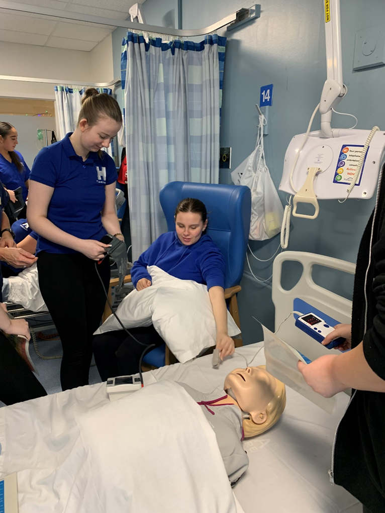 Students learn how to monitor patients vitals