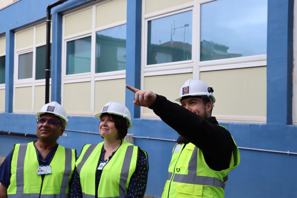 Anil Agarwal, consultant surgeon, Care Group Manager Alison Coates and Geoffrey Robinson site manager Tony Smith