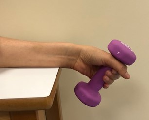 First part of the Resisted Wrist Deviation exercise.