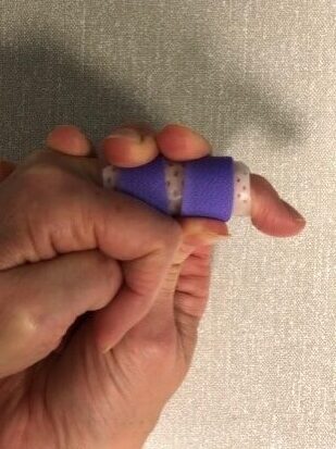 bending the tip of your finger down