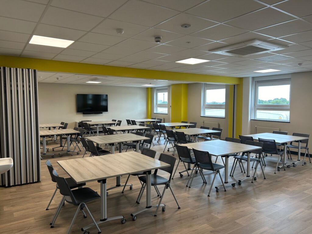 Academy large classroom set up cabaret style