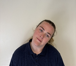A person with their head bent to the left.