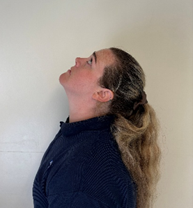 A person with their head leaning backwards.