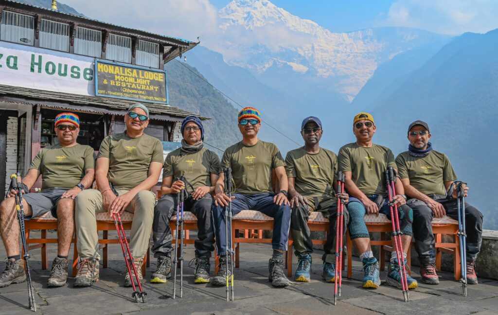 Team take a break outside of the Monalisa lodge