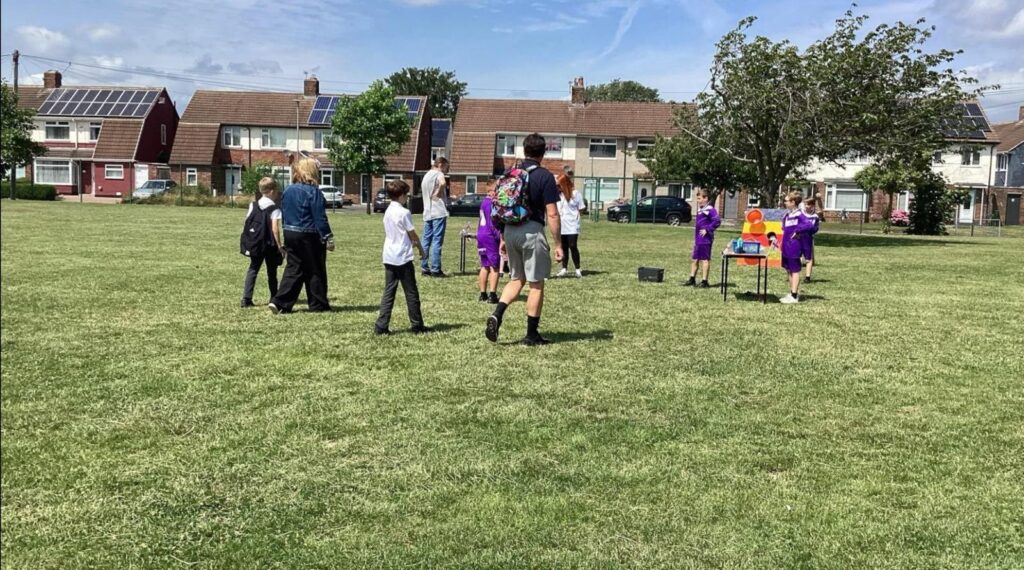 Children playing football.