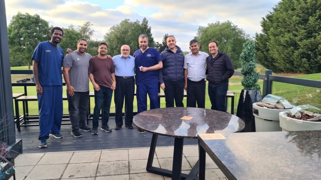 UHT colleagues meeting Professor Okasha.