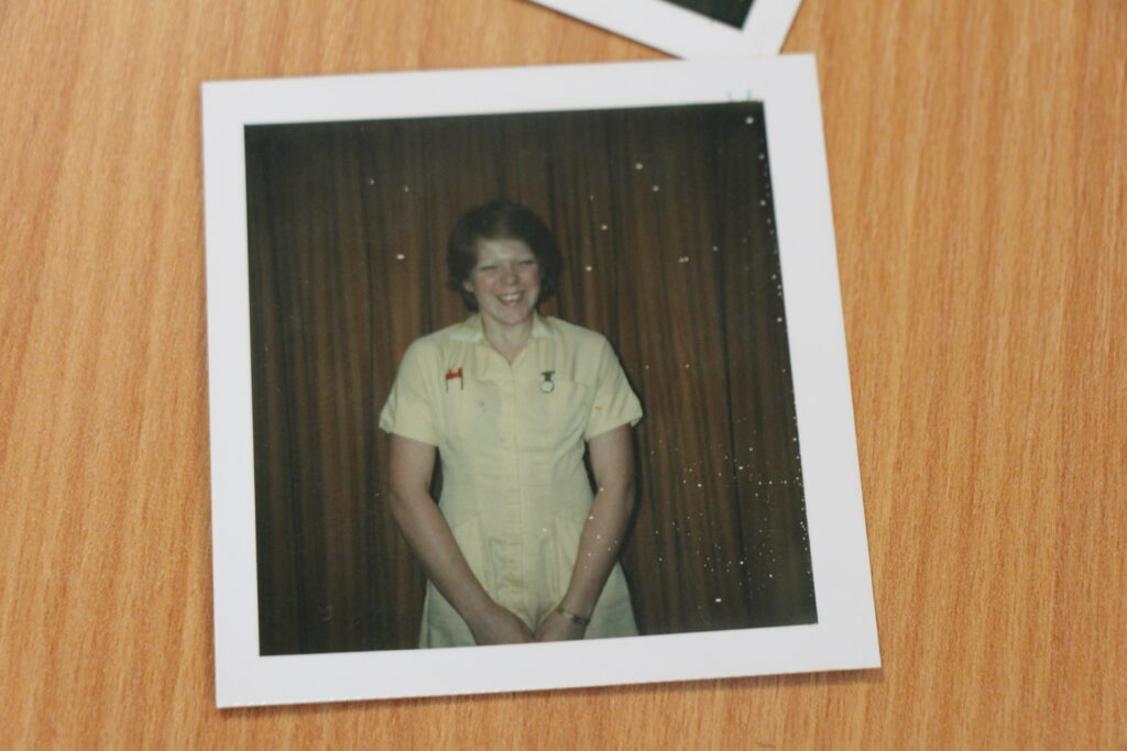 Janet Alderton as a cadet nurse in her yellow uniform