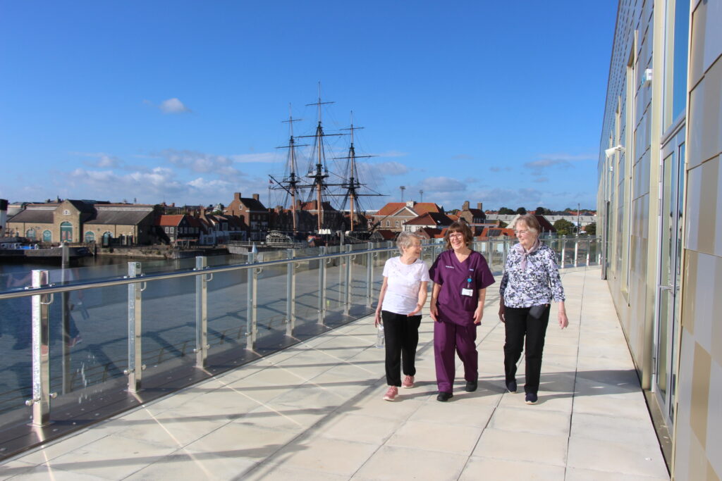 Walking outside the Highlight building with Hartlepool Marina in background