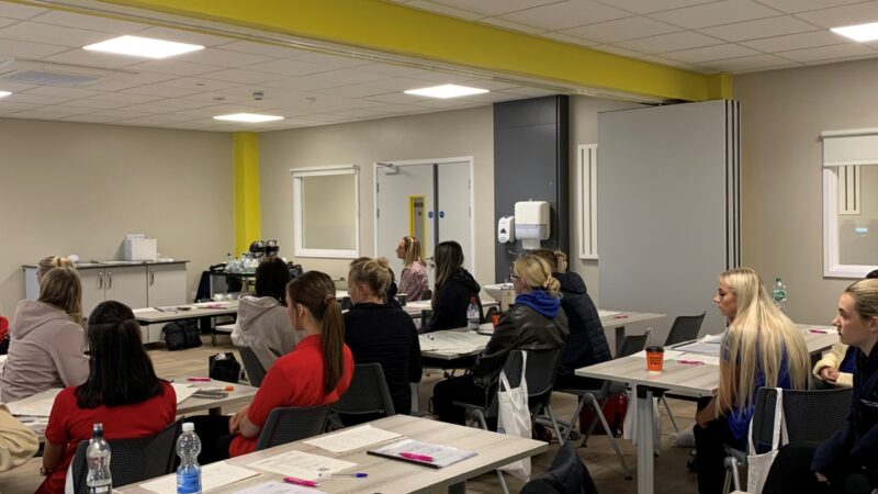 Students sat watching presentation as part of T Level induction process