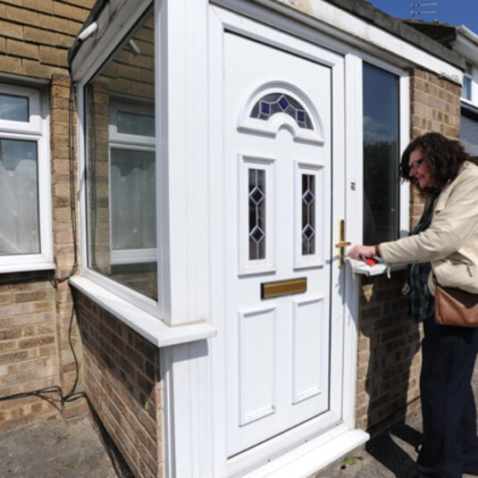 a patient going home and opening her front door