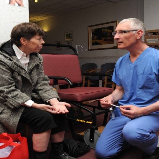 Nurse asks patient pre-surgery questions