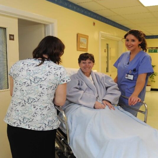 Patient is placed on operating theatre trolley