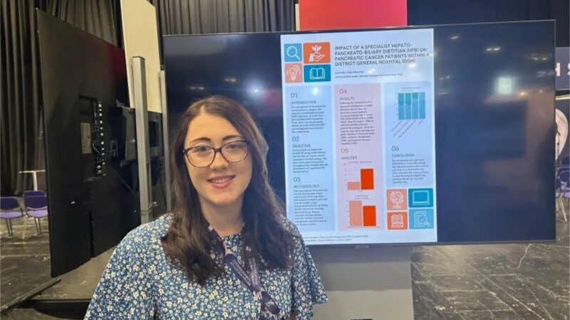 Dietitian with her abstract presentation.