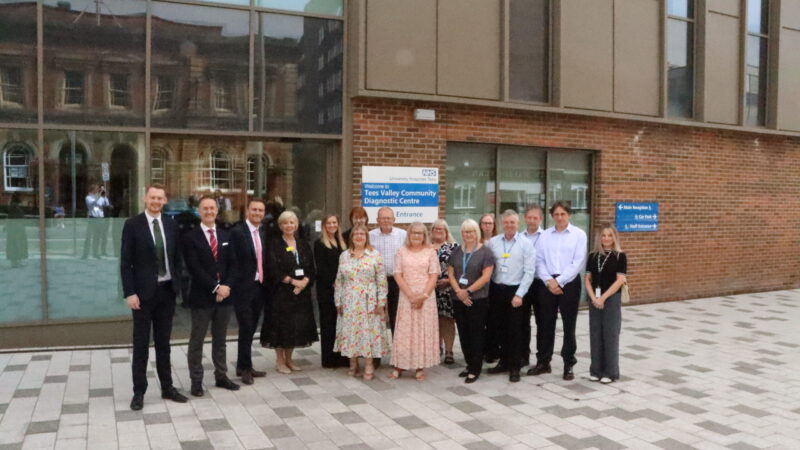 People standing in front of the diagnostic centre ahead of its opening.