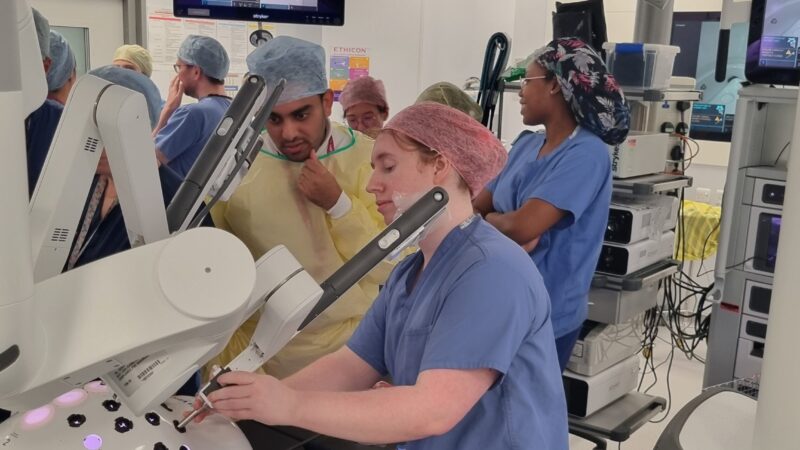 Doctors training on the robotic surgery machine