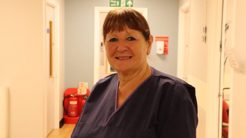 Headshot of Sandra Brennan in urology corridor