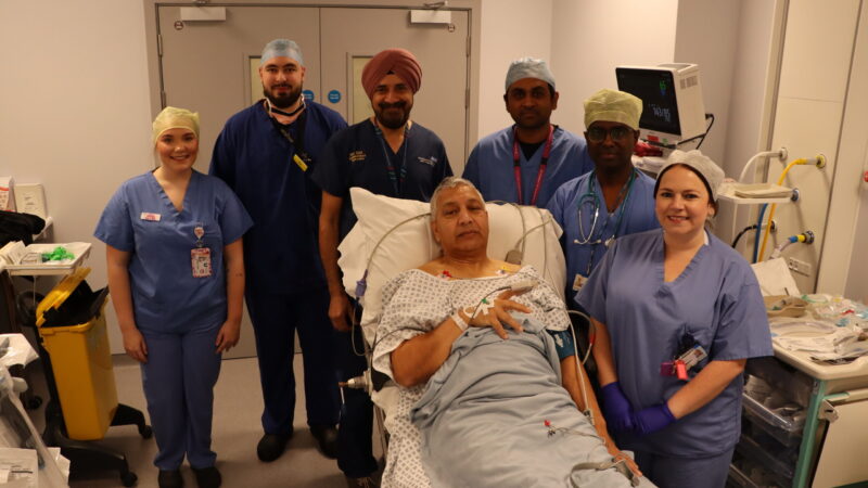 Patient with theatre robot team.