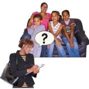 family sat on a sofa