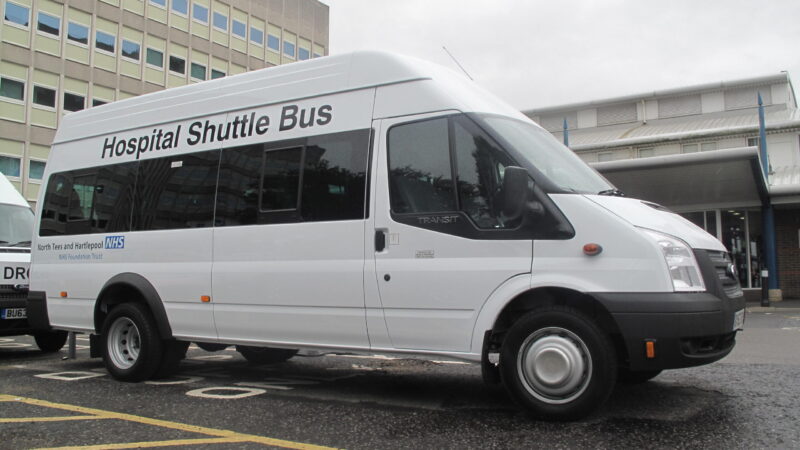 Mini bus outside the University Hospital of North Tees.