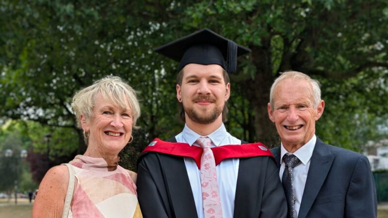Audiologist Tom Prince with family at his graduation ceremony.