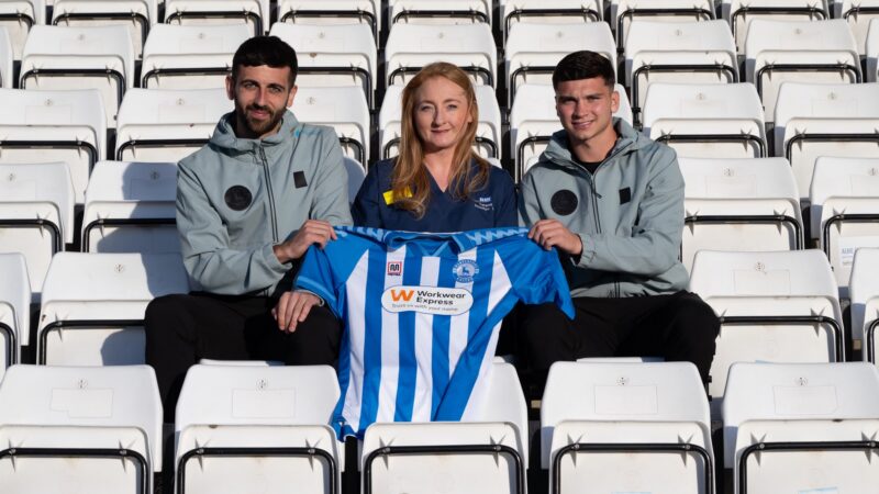 Hartlepool footballers Jack Hunter and Jamie Miley with Teresa Pounder, University Hospitals Tees’ education and training partner
