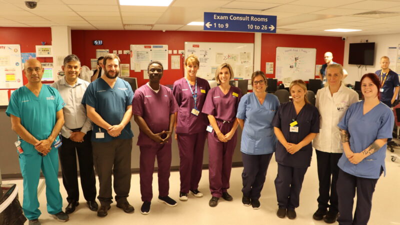 Emergency care team stood in the department.