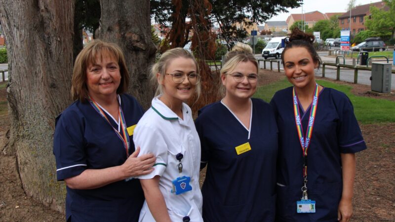 Chris, Victoria, Alex and Nicole in their work uniforms.