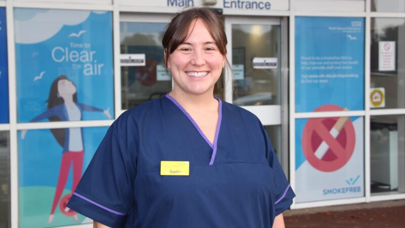 Sadie Hewson stands outside of Hartlepool Hospital.