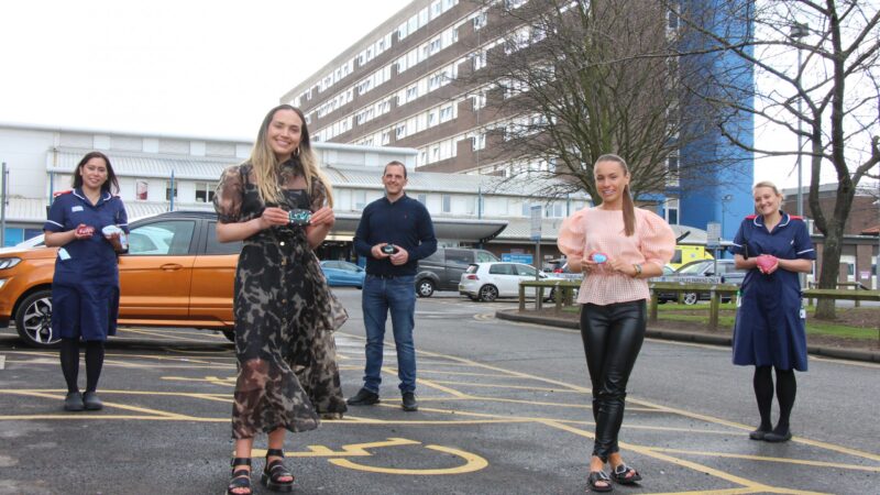 Lily Bingham and Lucy Johnson with critical care staff.