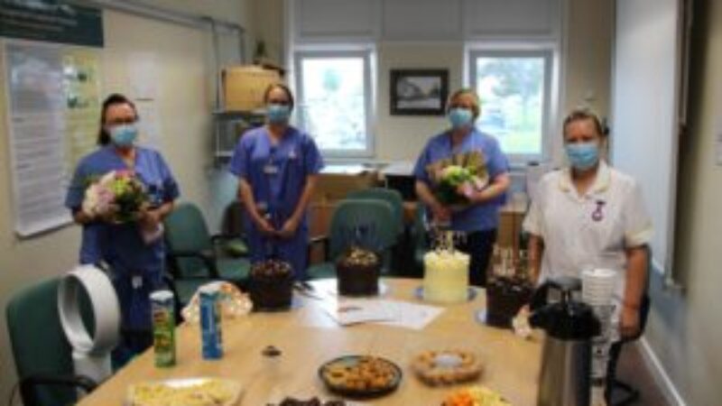Staff with cakes