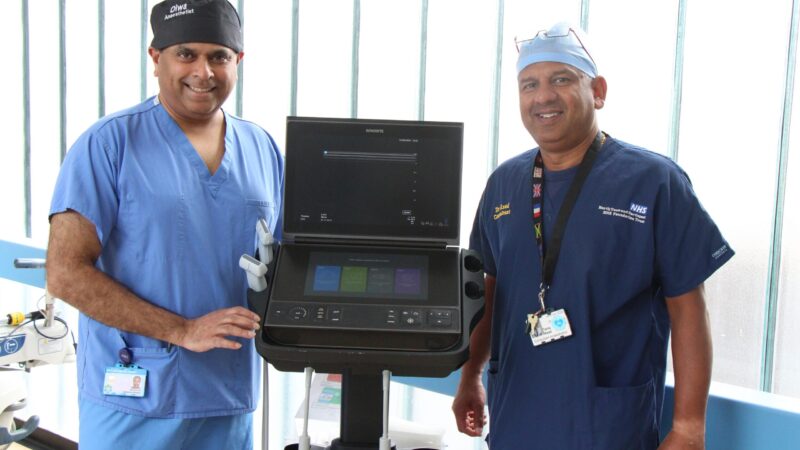 Consultant anaesthetists Subramani Diwakar and Tariq Azad with an ultrasound scanner used to locate the precise nerve to administer the pain relief to reduce the risk of developing pneumonia.