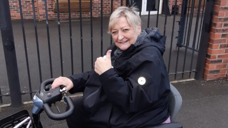 Louise Wales on a mobility scooter