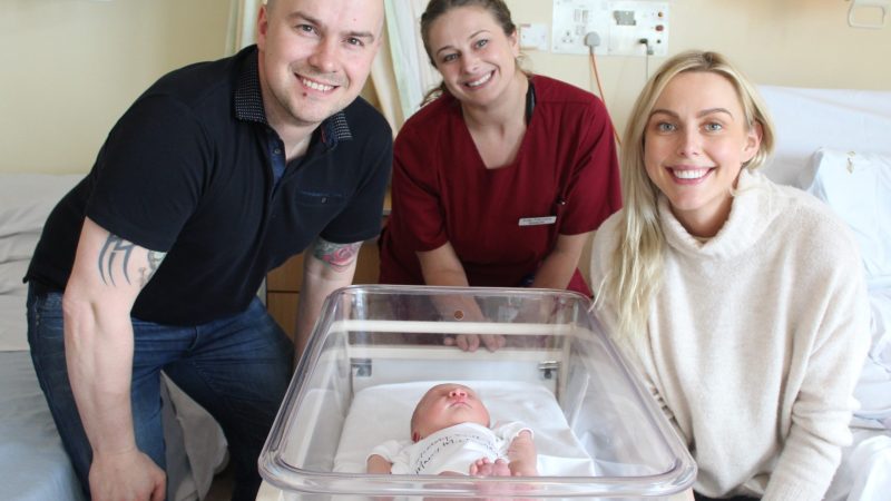 Scott Gretton and Rachel Taylor with their newborn