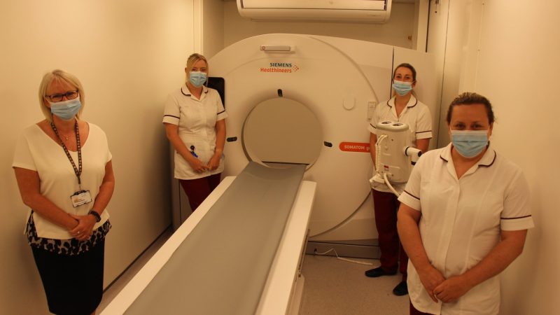 The radiology team with the new scanner