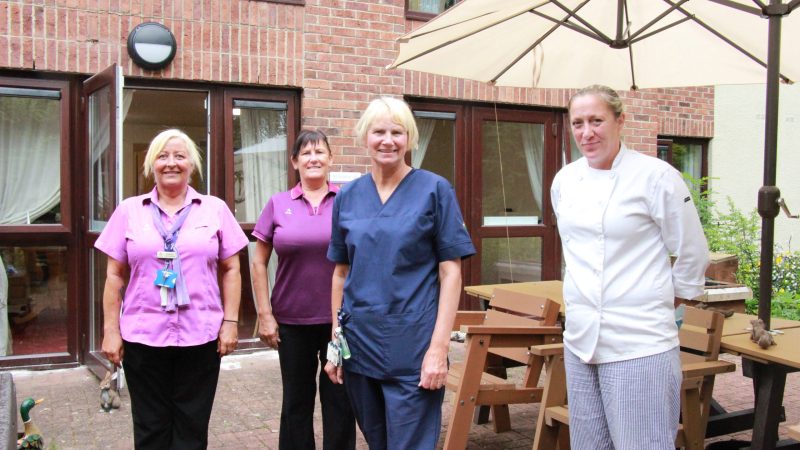 Gill with staff from the care home.
