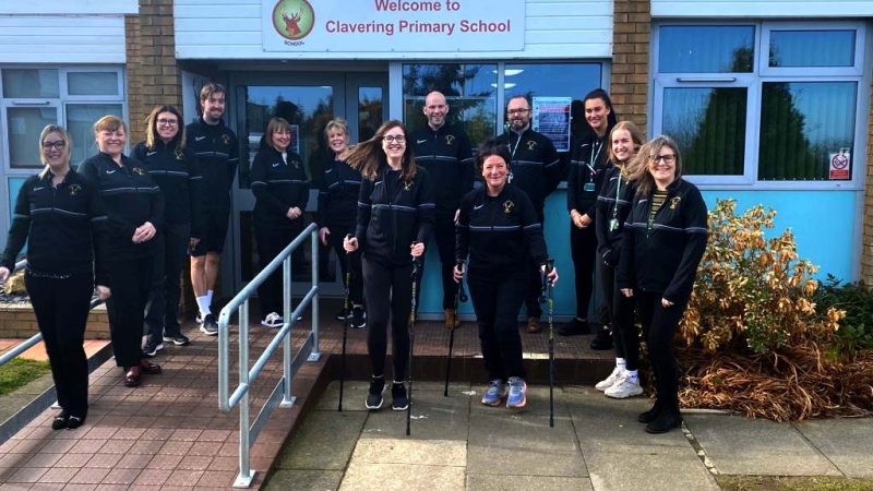 Clavering Primary School staff standing outside the school.