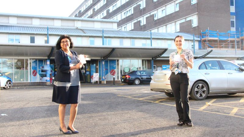 The education team stands outside the University Hospital of North Tees.